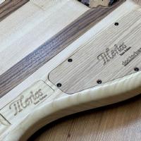 Merlos Trium Fretless 5